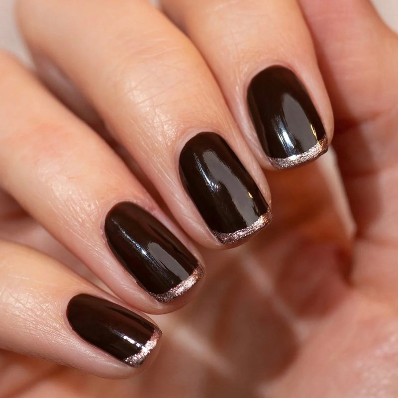 black nails featuring matte and glossy finishes with 3d art