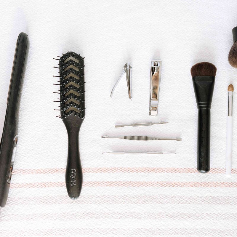 brushes for nail design drying after cleaning on a brush stand