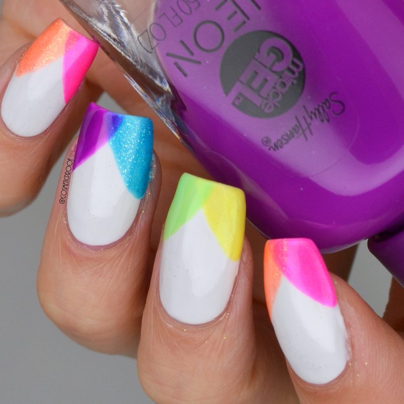 manicure tools and neon nail polish bottles ready for nail care