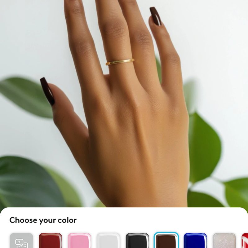 screenshot of a random nail design generator showing diverse nail art inspiration