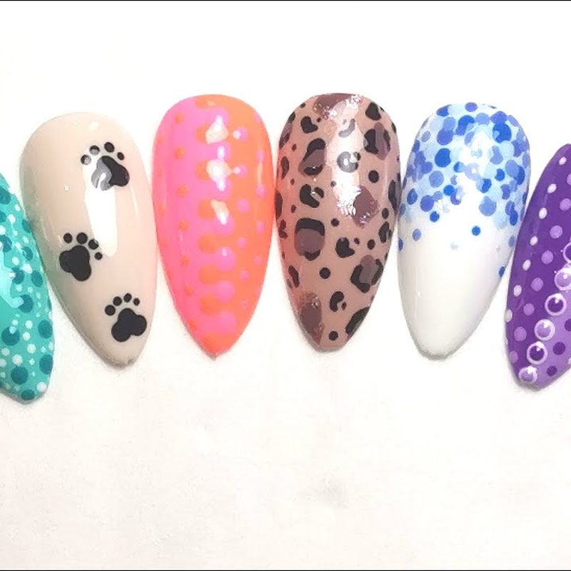 using dotting tools and brushes for creative nail art techniques