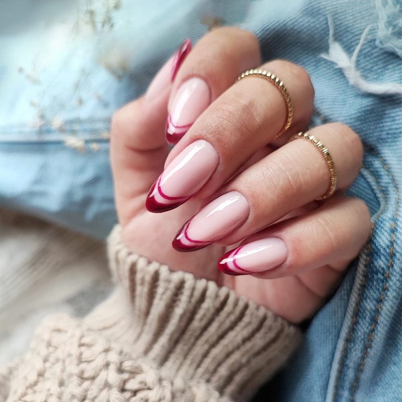 close-up of classic vintage manicure with pastel shades and retro patterns