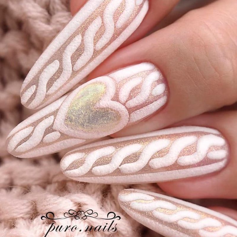 close-up of nails featuring sweater design with knit texture