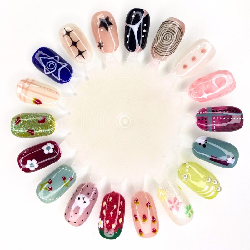 Creative nail art designs displayed on a nail design wheel for manicure inspiration