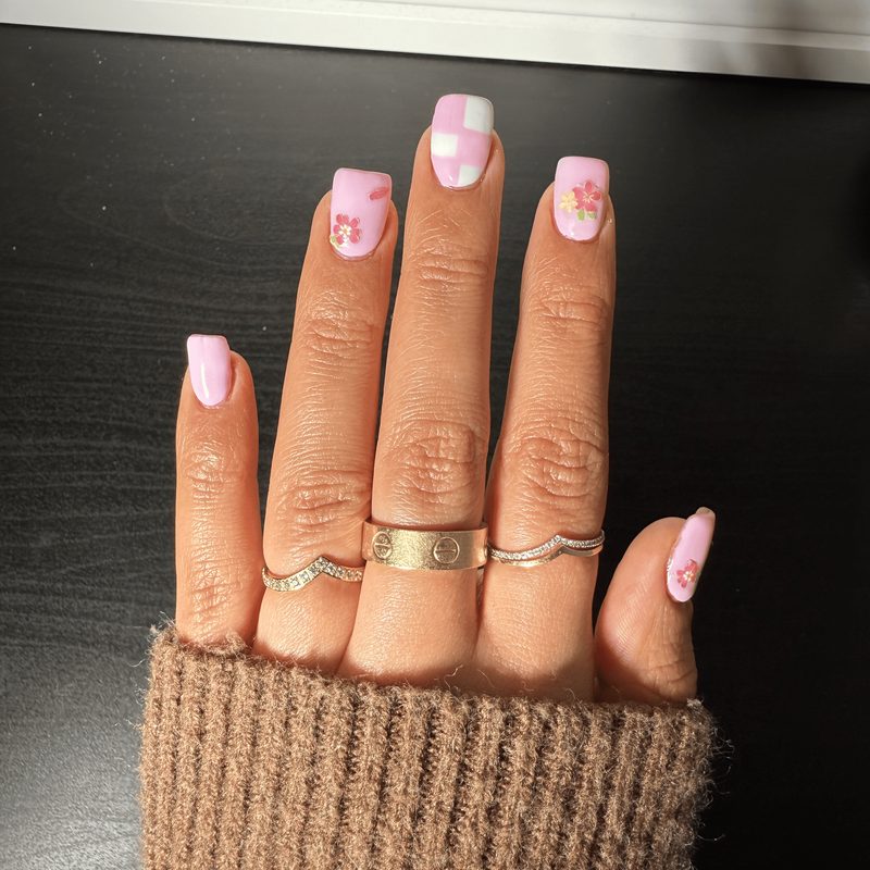 hands showing well-maintained spring short nails with moisturizing