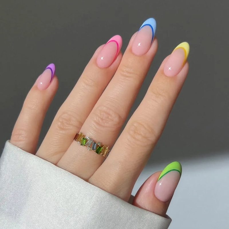 pastel acrylic nails with seasonal floral and glitter details