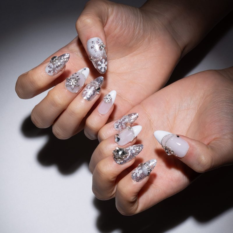 seasonal coffin nail designs featuring floral and festive patterns