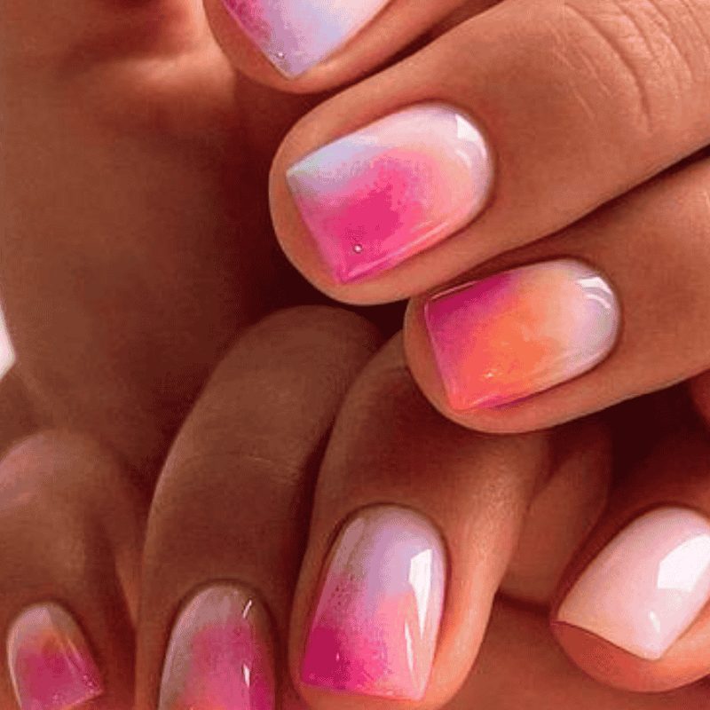 SNS nail powder application on summer manicure