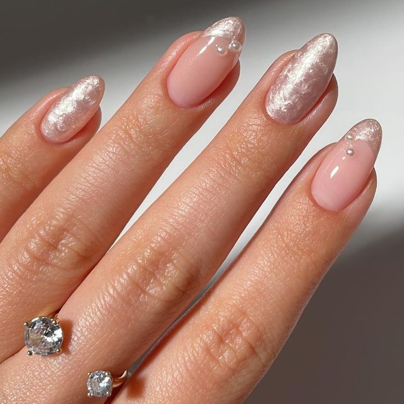 winter and summer pearl nail designs showcasing seasonal manicure trends